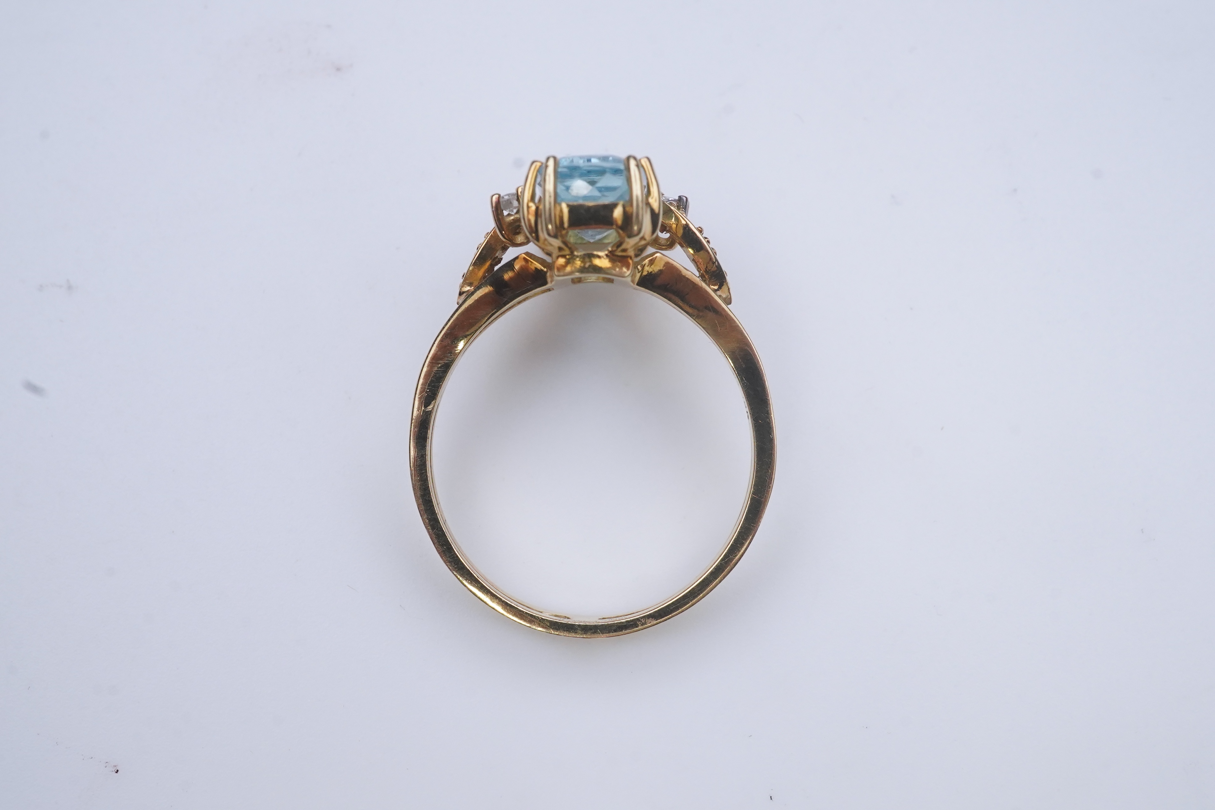 An aquamarine and diamond ring